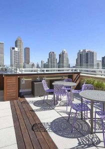 apartment rooftop patio with views of the downtown Chicago skyline