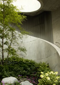 a winding concrete staircase below apartments in Lakeshore East neighborhood of Chicago