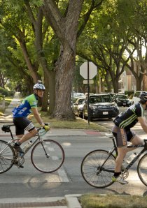 cyclists at intersection in Budlong Woods neighborhood of Chicago