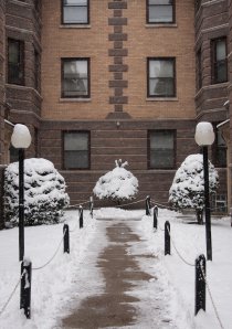 snow in a Chicago apartment building courtyard