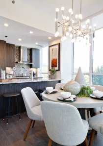 dining area and kitchen with marble waterfall counters in luxury apartment for rent in River North, Chicago
