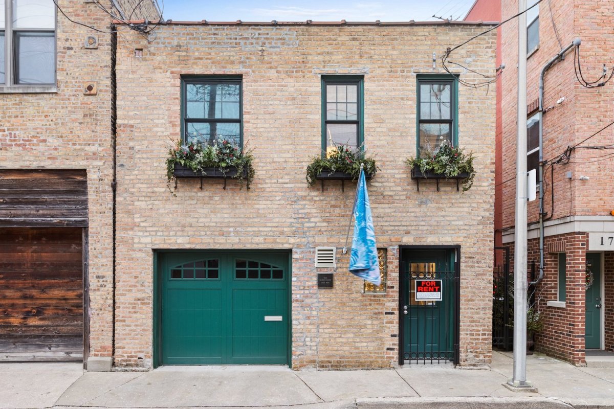 Two-story single-family home for rent with brick exterior in Lincoln Park