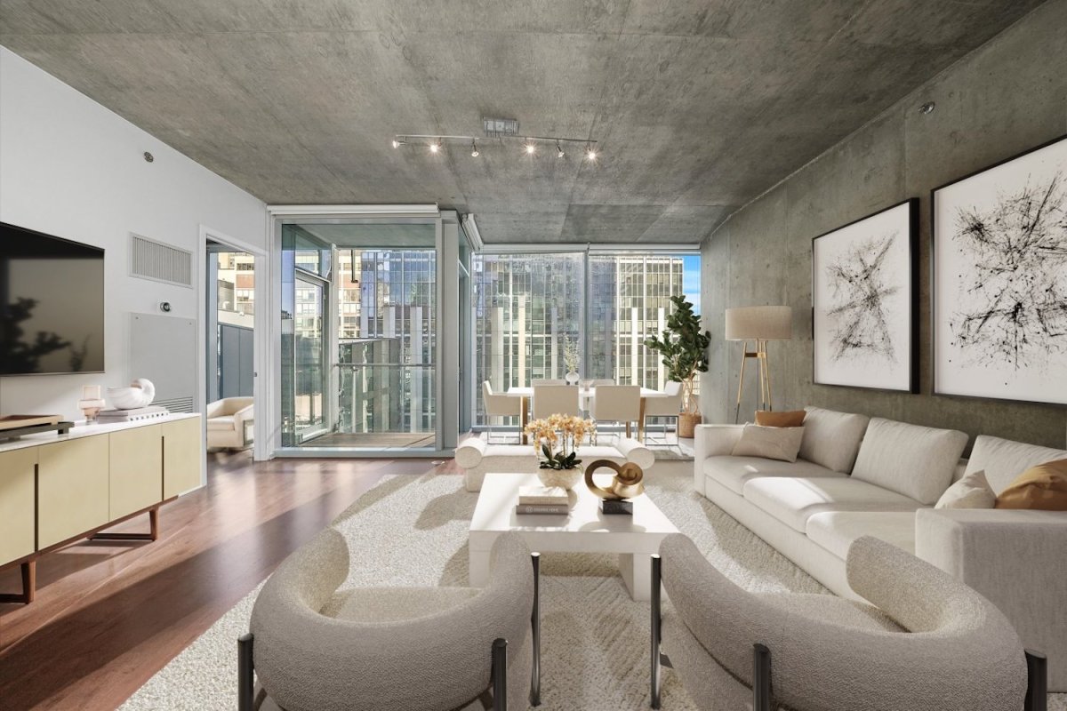 Luxury Streeterville condo with concrete ceiling and wall and floor-to-ceiling windows