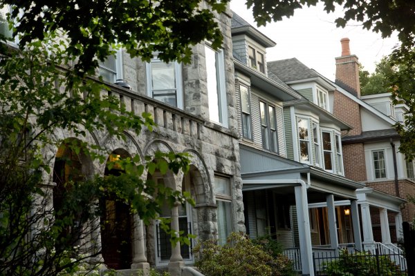 Stone masonry facade and front porches on single family homes in Graceland West Chicago