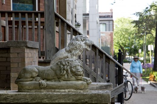 Vintage statues on apartment building exterior in Bucktown Chicago