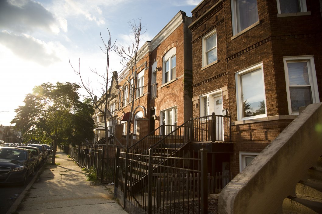 Vintage two flat apartments on neighborhood street in East Garfield Park Chicago